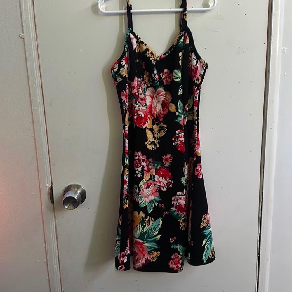 2020 ambiance apparel dress it is black with a spaghetti strap sleeve